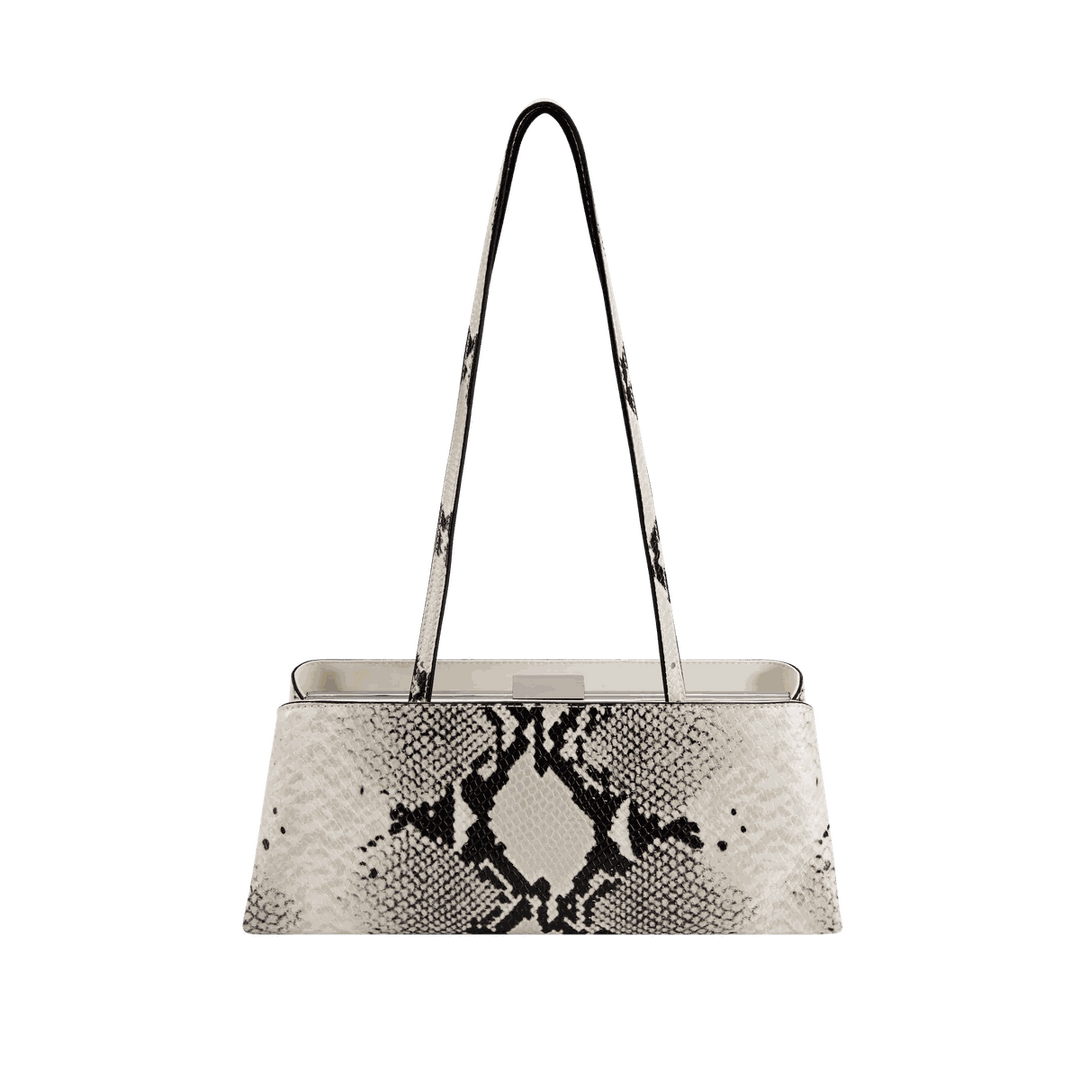 Leclair sleek handbag with structured frame and black and white snakeskin pattern