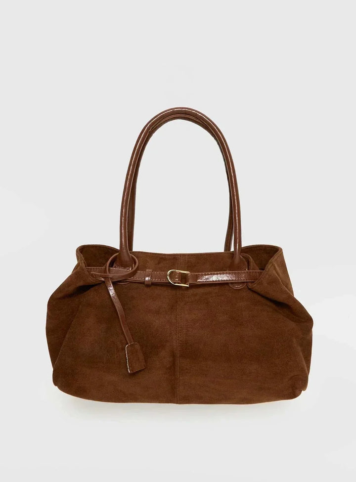 Brown suede tote bag with belted detail and double handles, elegant and softly structured design