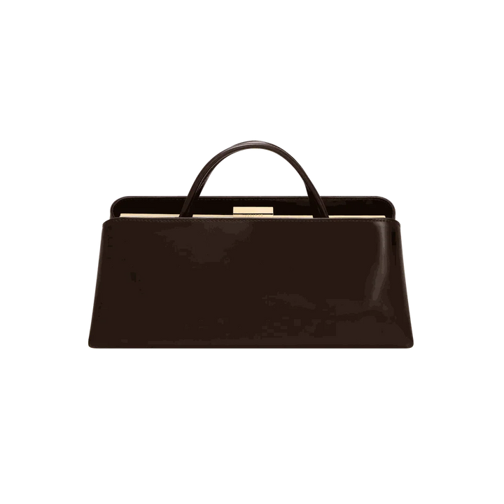 Leclair Handbag sleek black sculptural leather handbag with structured frame closure and top handle