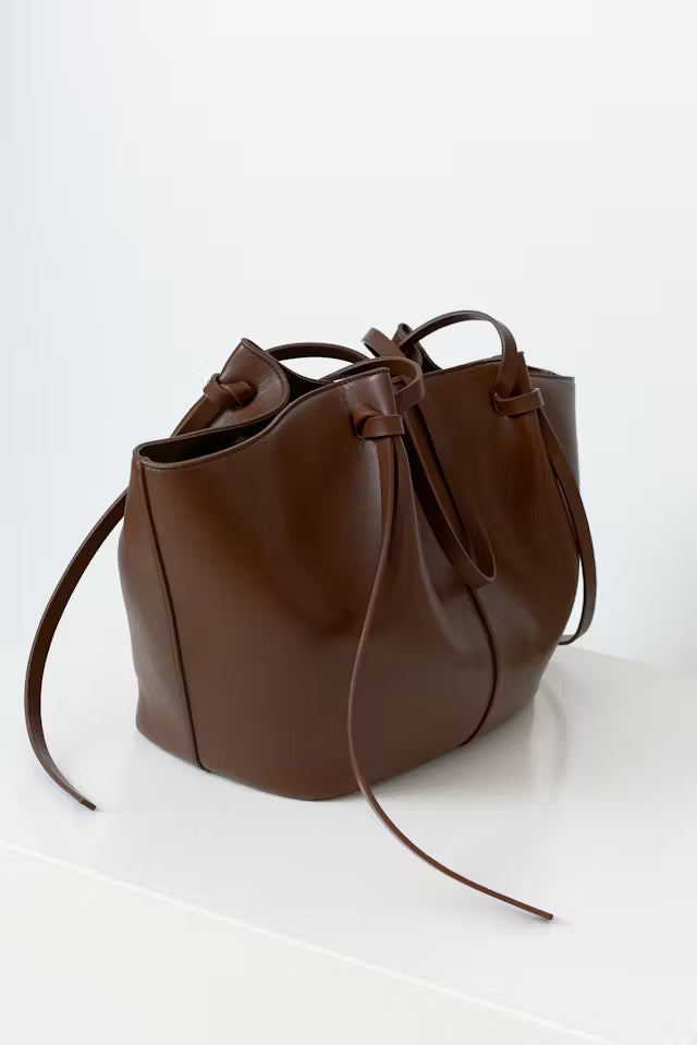Brown vegan leather Delair tote bag with spacious design and minimalist style