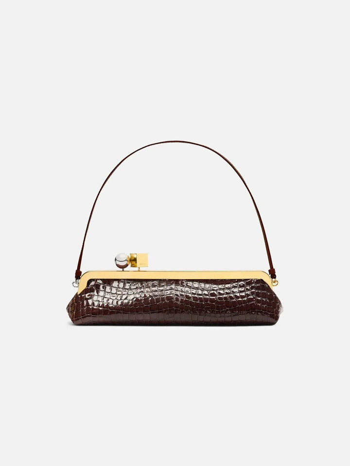 Sleek Venti clutch bag in crocodile pattern vegan leather with gold dual-metal clasp and frame