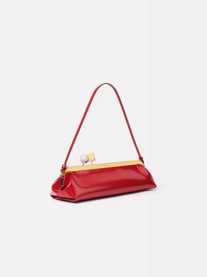 Red Venti clutch bag with gold frame and dual-metal clasp made from smooth vegan leather
