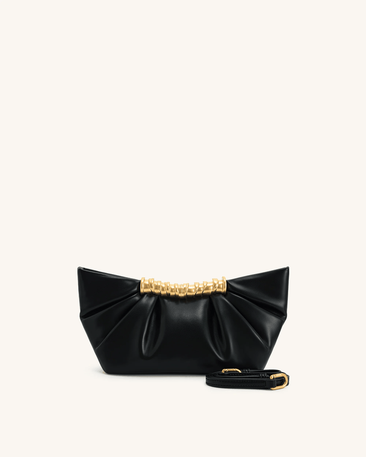 Black Lia clutch bag with soft pleats and sculptural gold bar, detachable strap, vegan leather