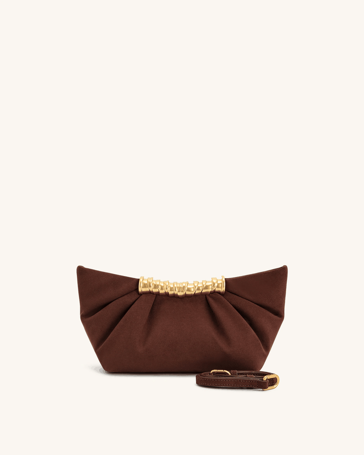 Brown Lia clutch bag with gold bar detail and detachable strap made of vegan leather