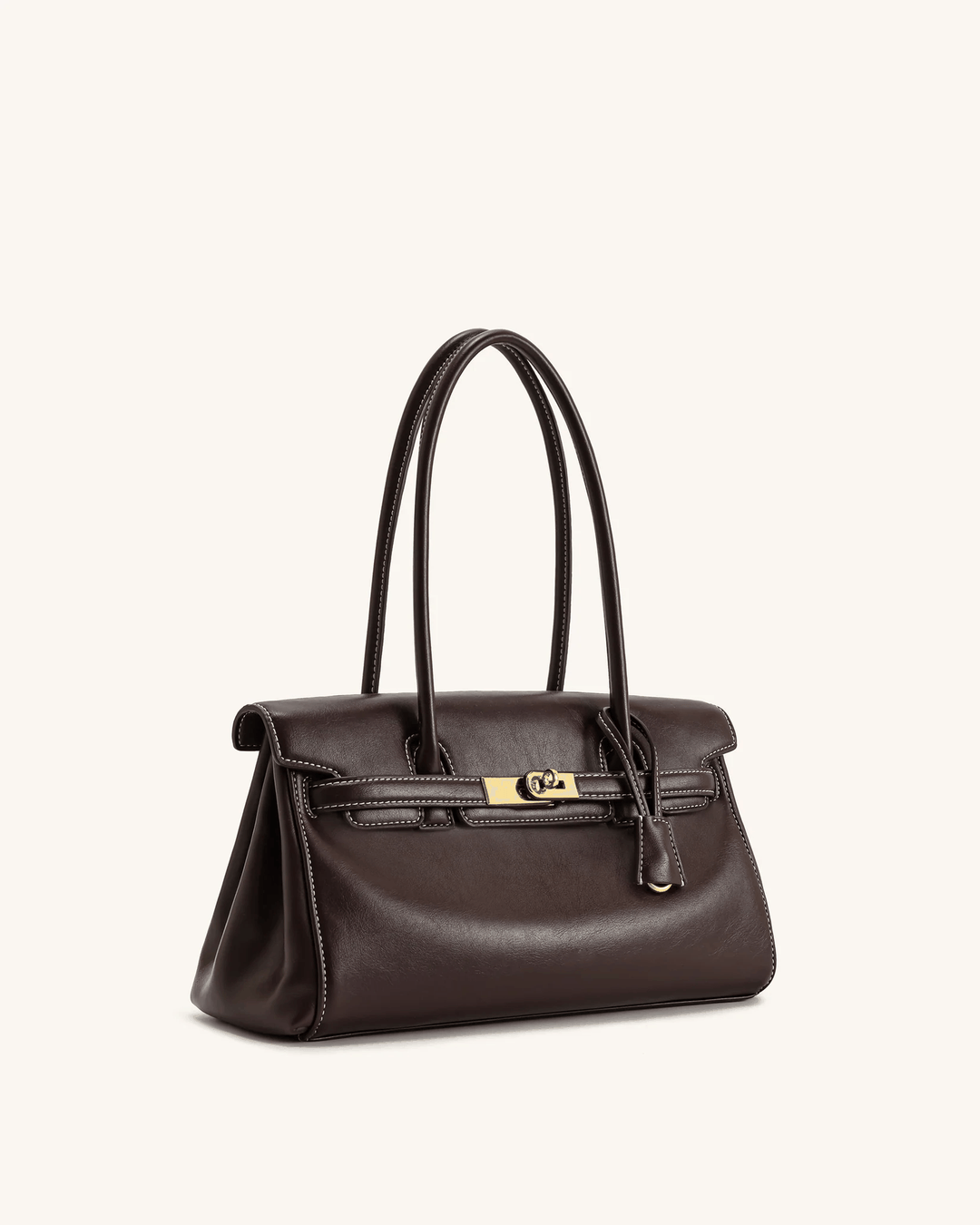 Marisse structured shoulder bag in smooth dark leather with gold details and long handles.