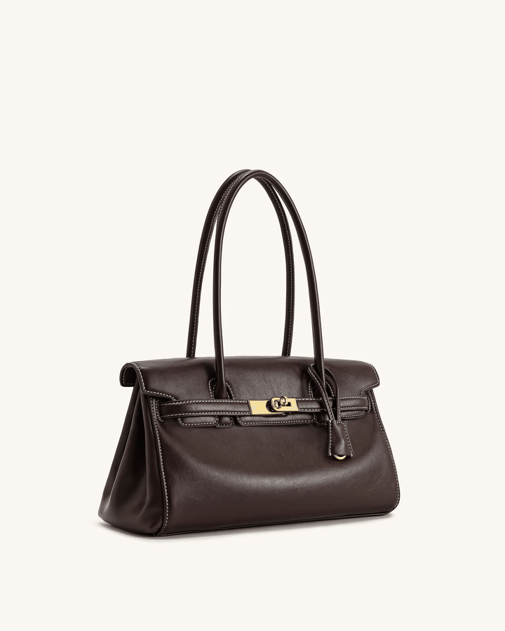 Marisse structured shoulder bag in smooth dark leather with gold details and long handles.