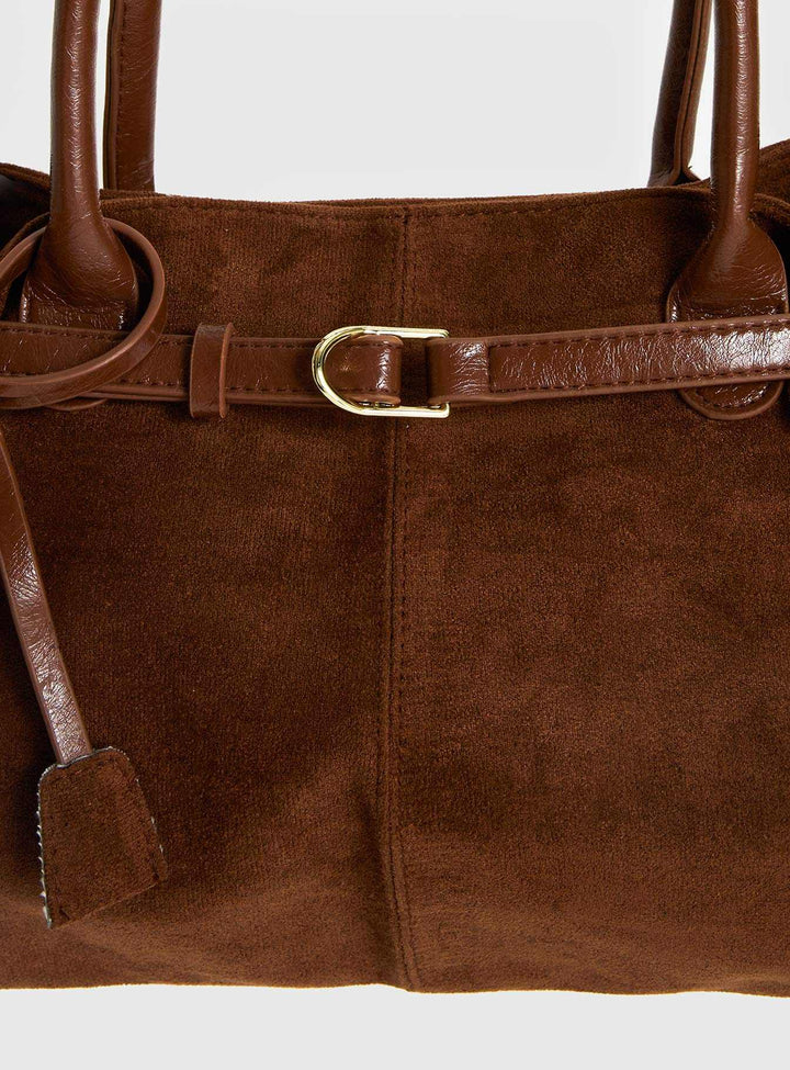Brown suede tote bag with belted detail and soft structured design