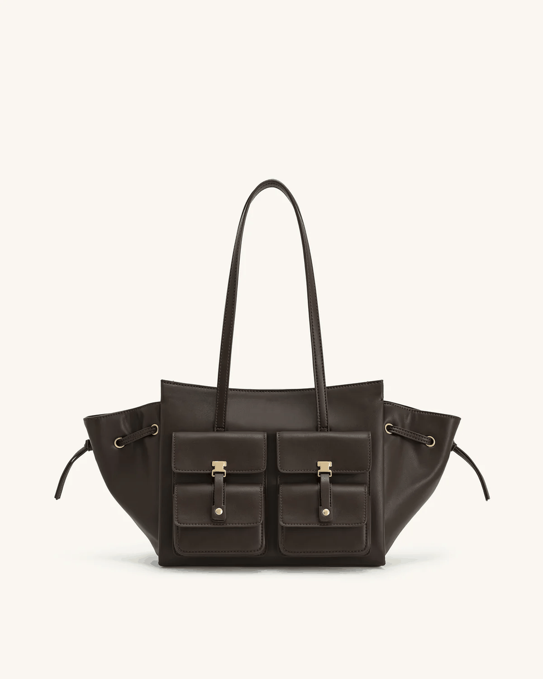 Black Tilda tote bag with dual front pockets, extended sides, and metallic accents