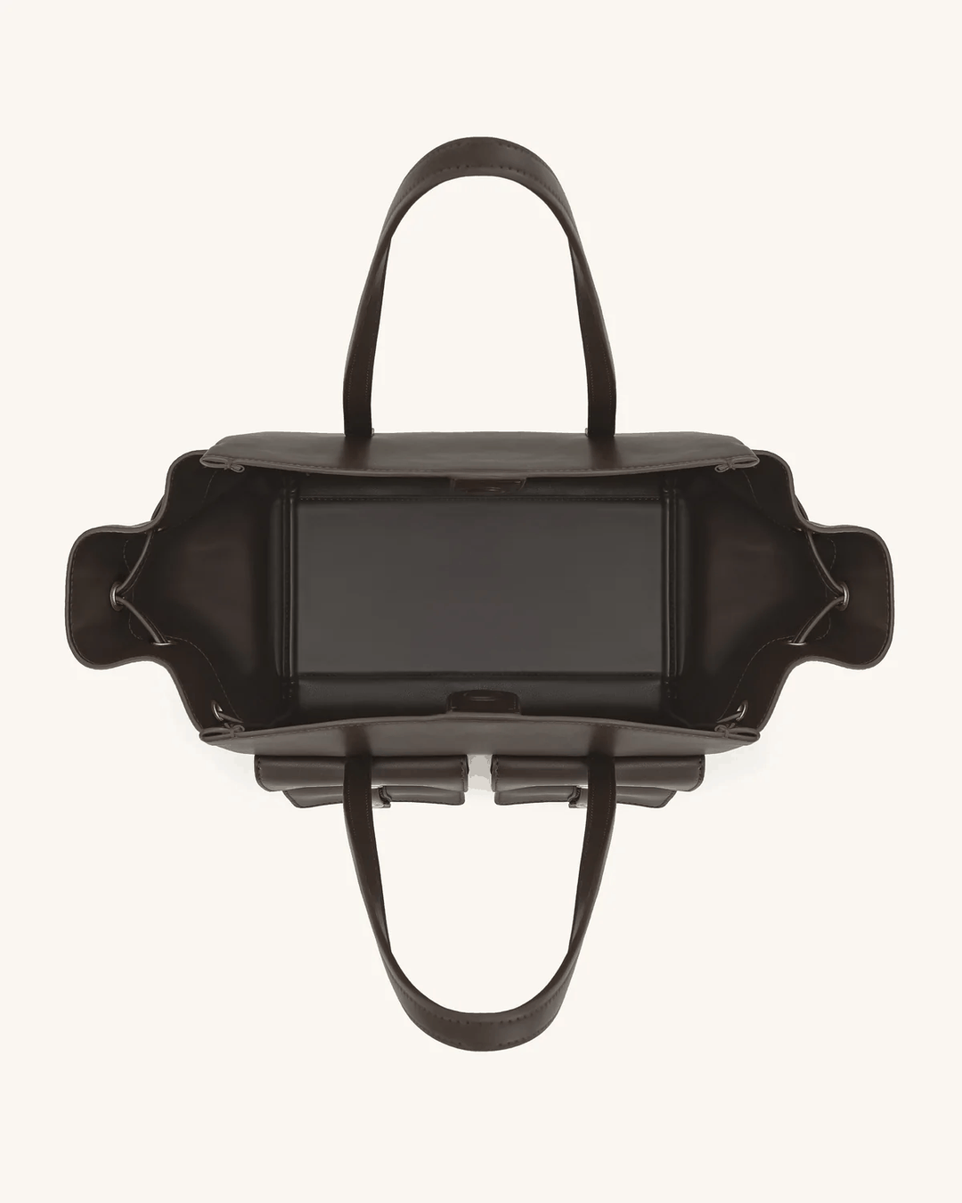 Black Tilda tote bag with dual front pockets, extended sides, and metallic accents, shown open from above