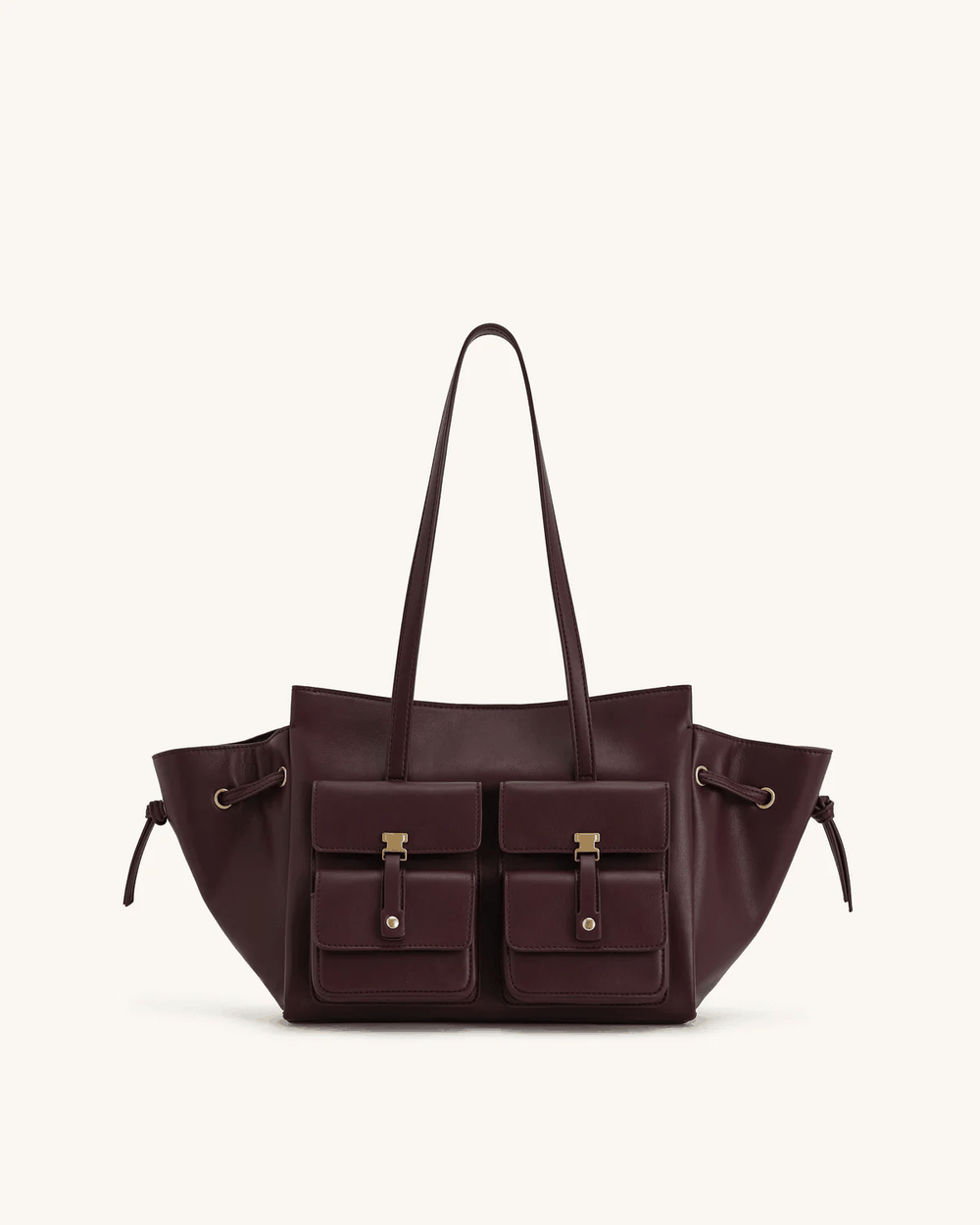 Chic Tilda Tote Bag with dual front pockets and metallic accents in dark brown leather