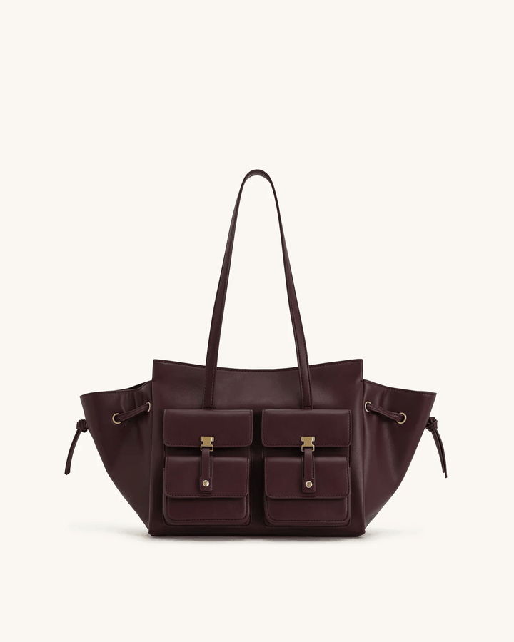Chic Tilda Tote Bag with dual front pockets and metallic accents in dark brown leather