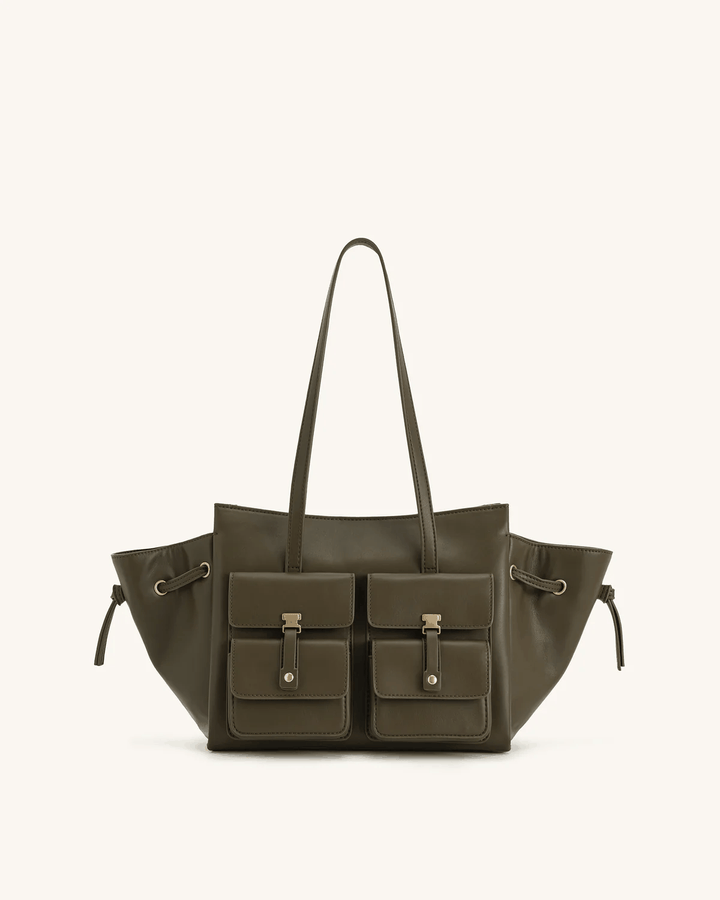 Tilda Tote Bag in olive with dual front pockets, extended sides, and metallic accents, measuring 45x13x22 cm.