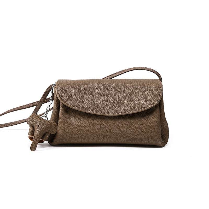 Eloise Charm Crossbody bag in genuine cowhide leather with elephant charm and magnetic closure