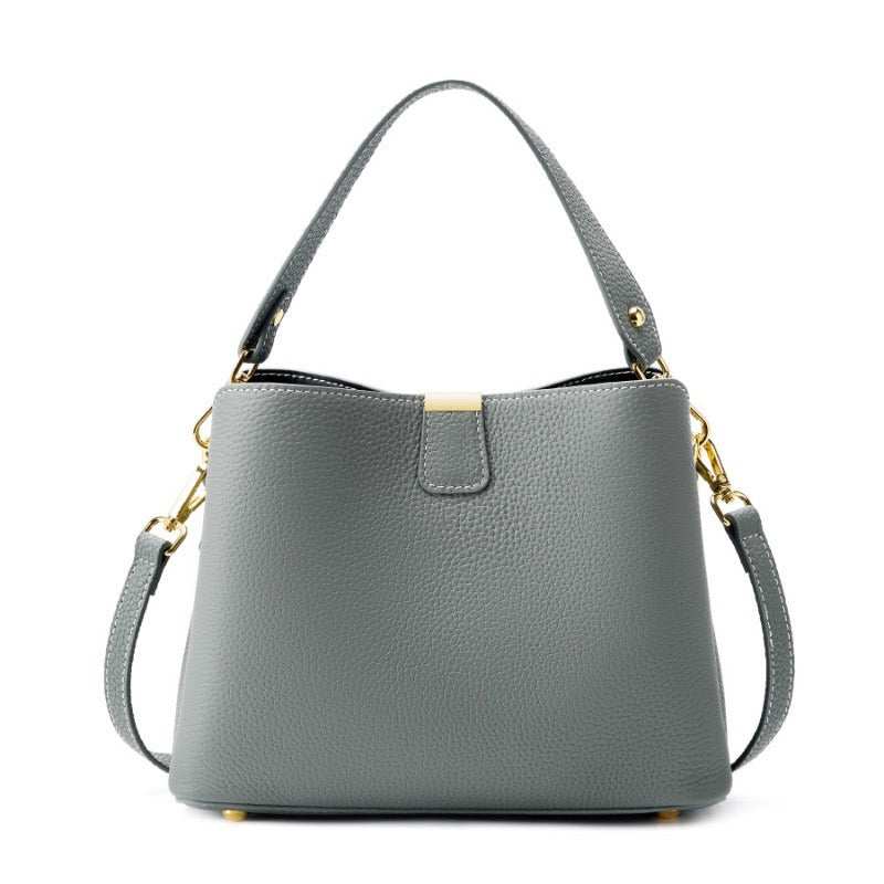 Amélie Bucket Bag in premium vegan leather with multiple carry options and secure zipper closure