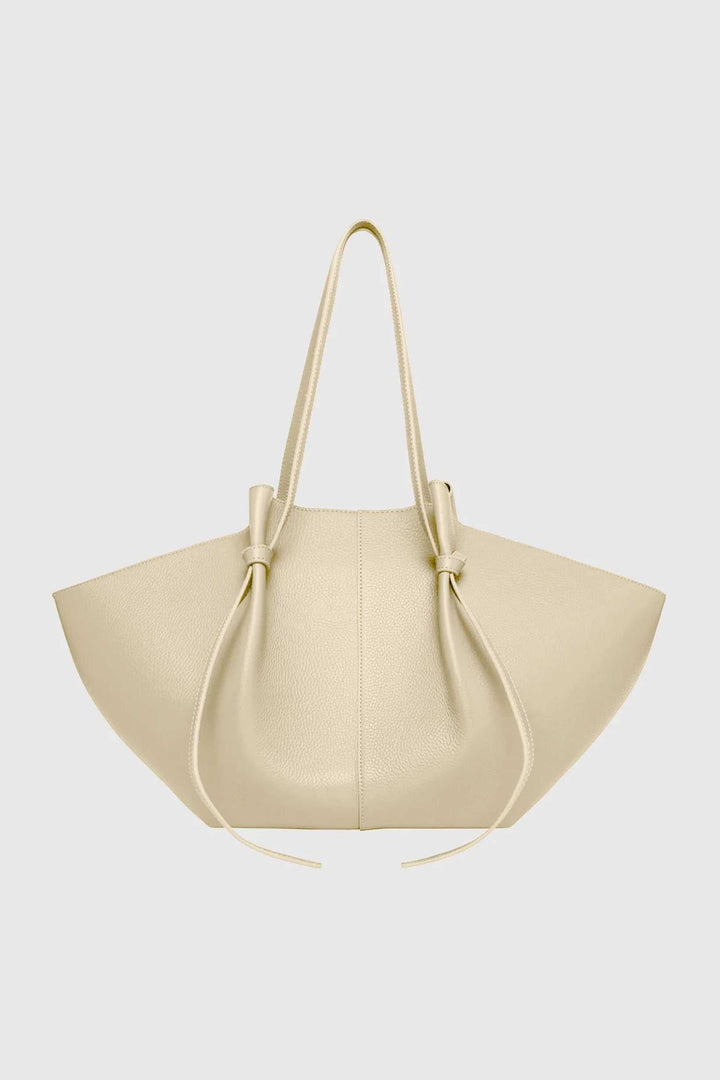Beige Savina tote bag made of vegan leather with knotted handles and spacious design