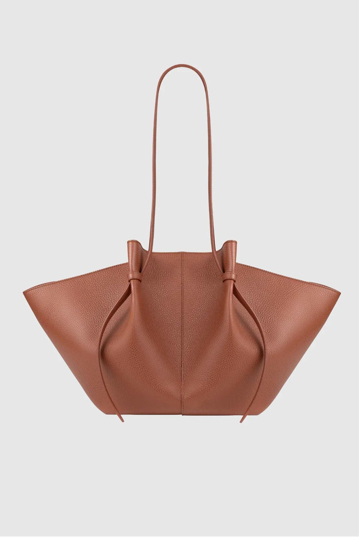 Savina tote bag in brown vegan leather with knotted handles and spacious design