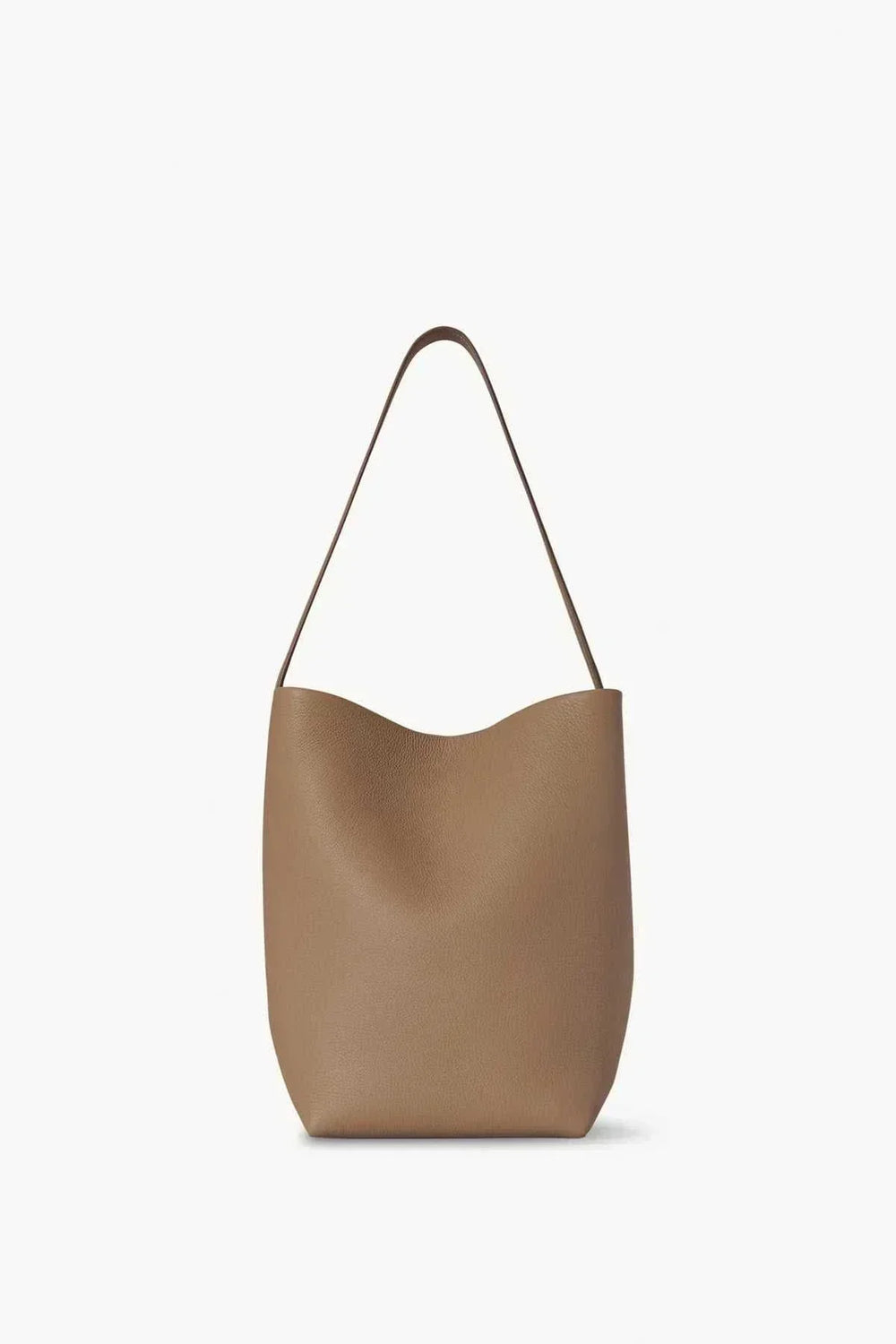 Minimalist brown vegan leather shoulder bag with curved top and single shoulder strap