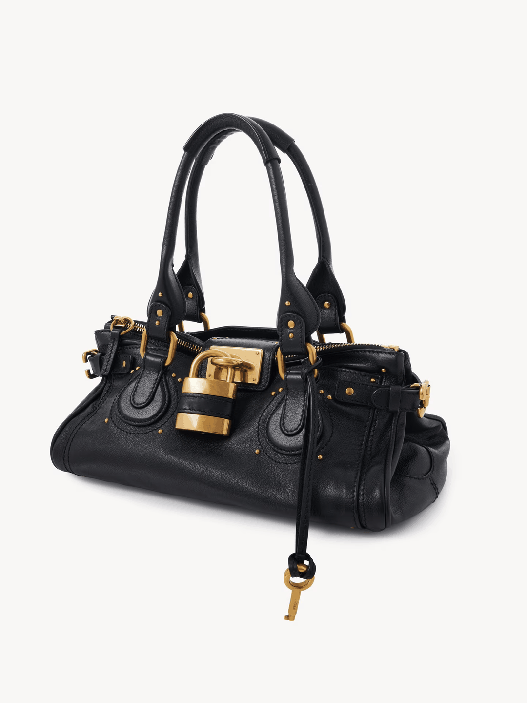 Black Marcelle Lock handbag with oversized gold lock and double handles made of smooth vegan leather