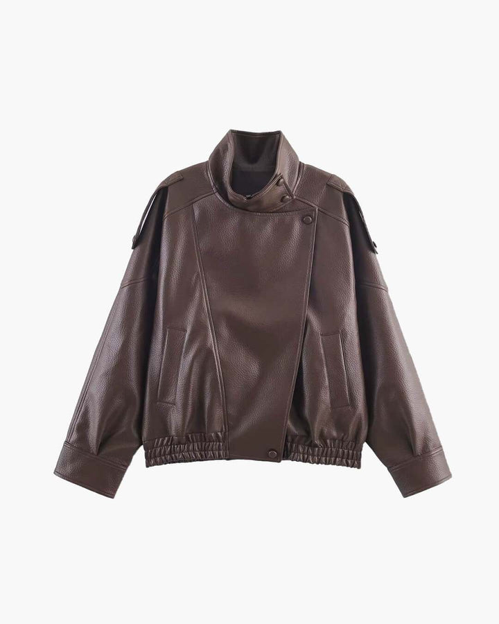 Women's oversized Brown faux leather biker jacket with high collar and elastic hem on white background.