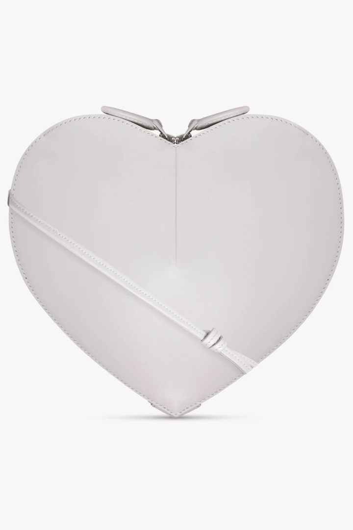 white 3D heart-shaped vegan leather crossbody bag with dual zip closure and adjustable strap