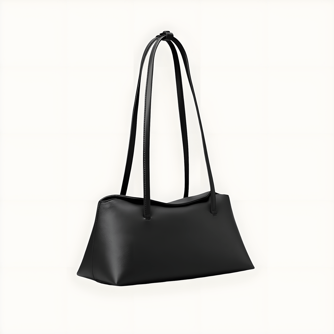 Black Christelle leather shoulder bag with magnetic snap closure and dual straps.
