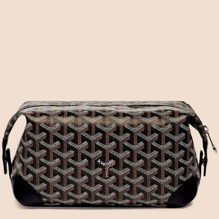 Colette Vanity Case in premium vegan leather with zip-around closure and structured silhouette for travel and daily use