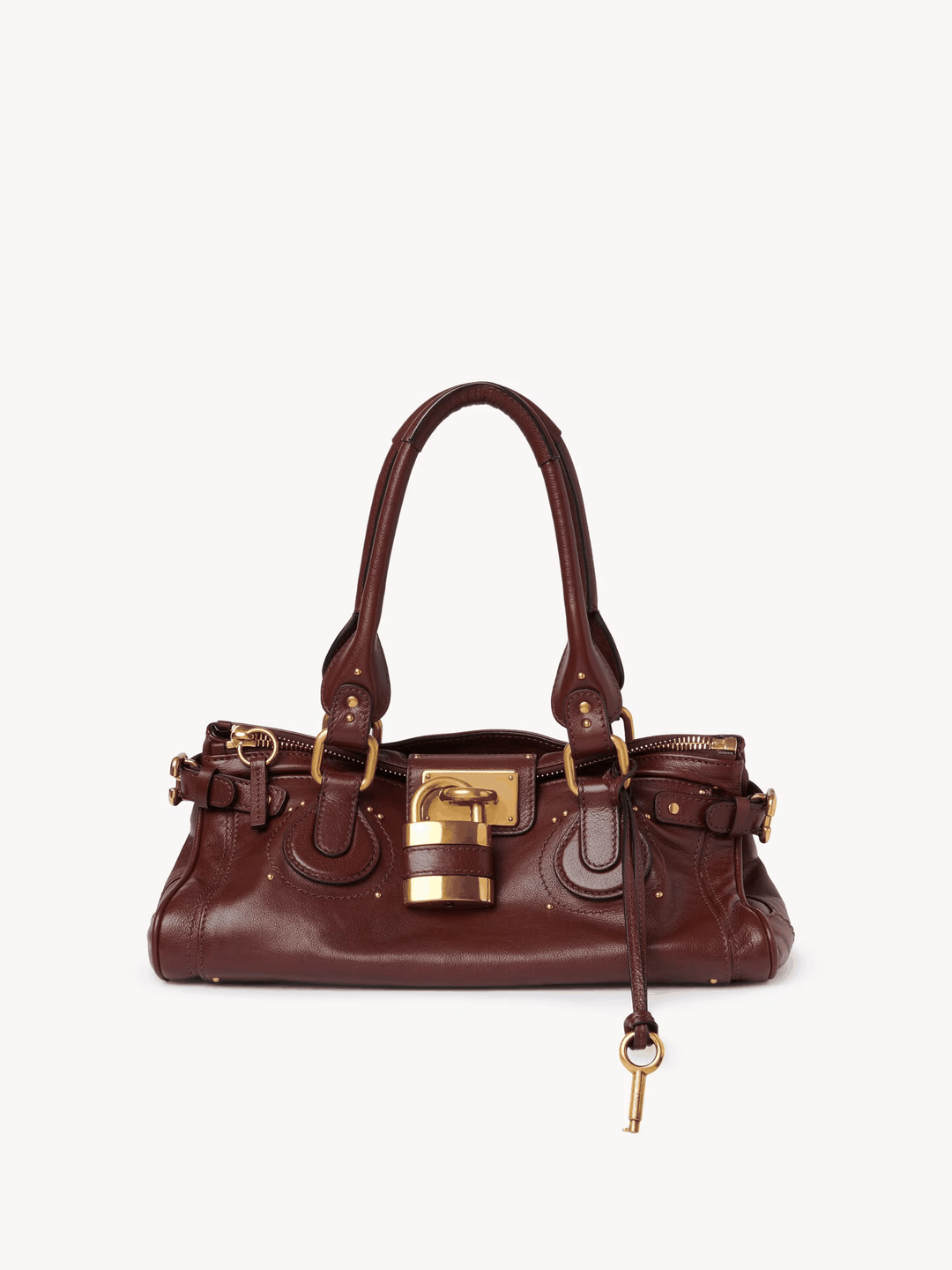 Marcelle Lock Handbag in brown vegan leather with oversized gold lock and double handles